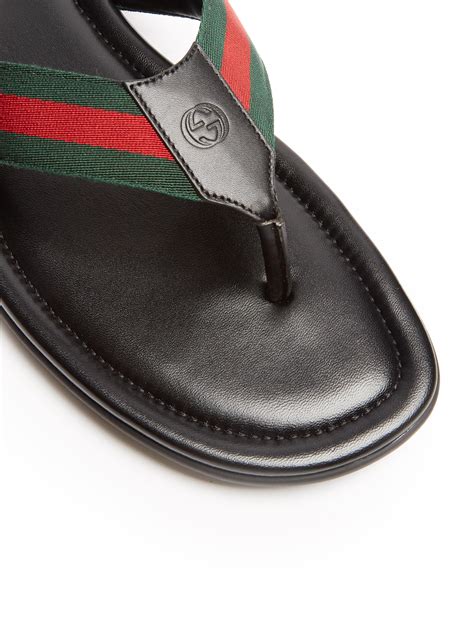 gucci flip flops.